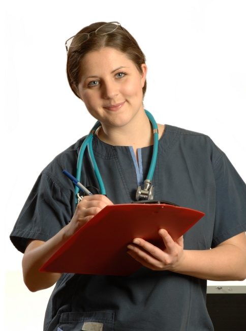 Health check, nurse with stethoscope holding clipboard smiling as if listening