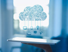 Cloud computing, Hand holding tablet with cloud icon above it raining other connectivity icons