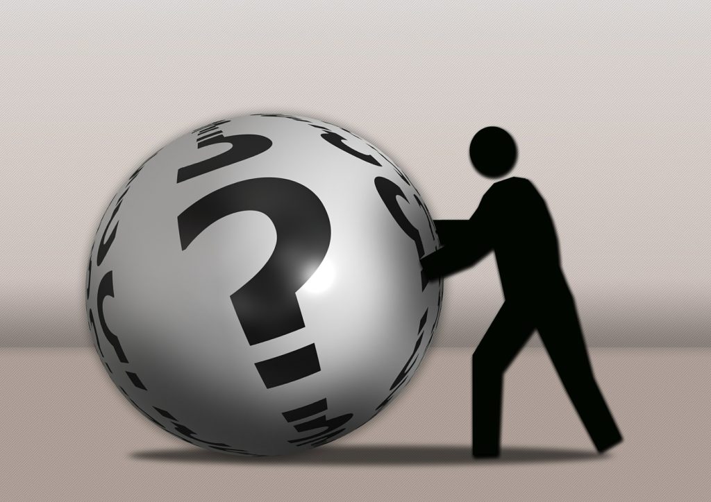 Human Error depicted by Black figure pushing question mark ball