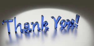 Thank you in blue letters in spot light