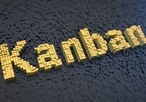 Blocks forming word "Kanban" in yellow over other black blocks