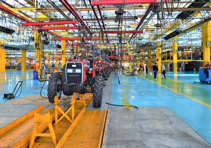 Colorful photo near end of Red Tractor Assembly Line